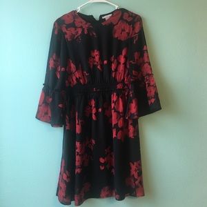 Black dress with red flowers.
